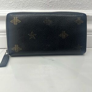 Gucci Black Zippy Wallet with Gold Bee and Star Design